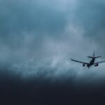 Plane Airplane Storm Clouds  - peterhoangkhanh / Pixabay