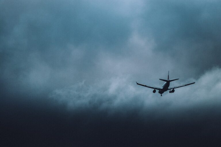 Plane Airplane Storm Clouds  - peterhoangkhanh / Pixabay